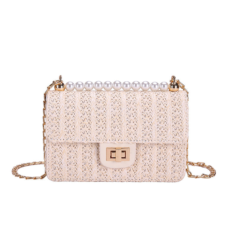 Straw pearl   with  wild texture fairy shoulder chain  bag