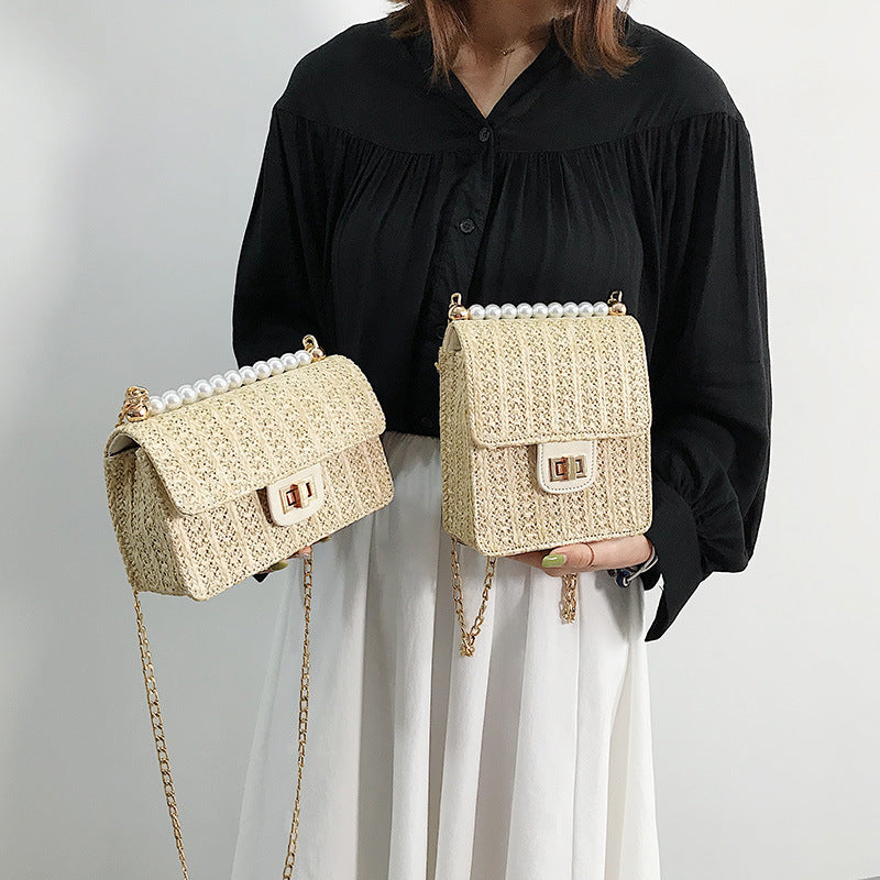 Straw pearl   with  wild texture fairy shoulder chain  bag