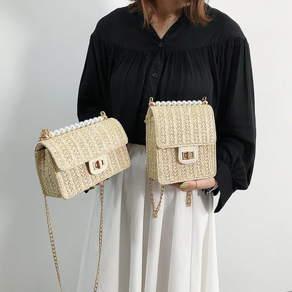 Straw pearl   with  wild texture fairy shoulder chain  bag